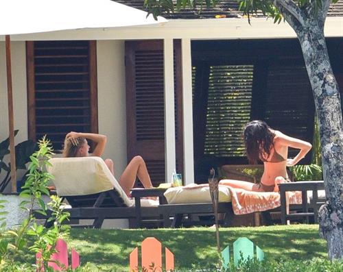 Kendall Jenner Bikini Pictures Hailey Baldwin and Kendall Jenner tanning in sexy thong bikinis seen by paparazzi.