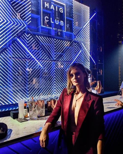 Charlotte de Carle braless boobs in an open jacket seen by paparazzi.
