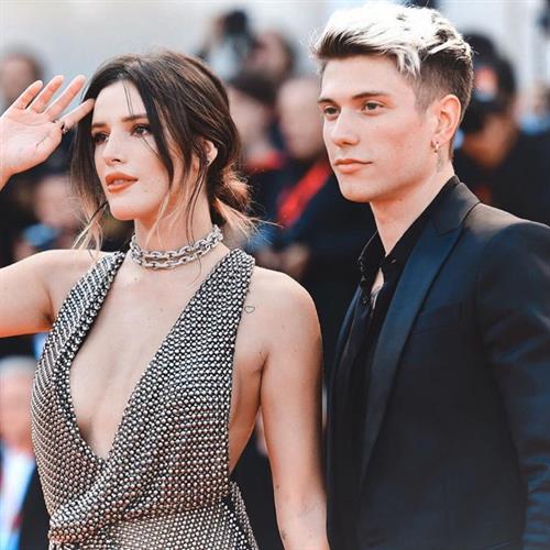 Bella Thorne in a sexy see through dress showing her boobs and ass in thong panties.




