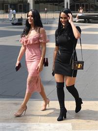 Nikki Bella braless boobs pokies in a black top showing off her tits seen by paparazzi with Brie Bella showing nice cleavage.










