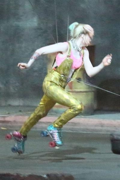 Margot Robbie sexy filming an action scene as Harley Quinn in the new movie  Birds of Prey .

















