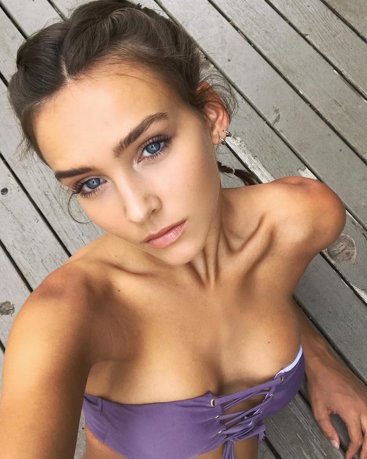 Rachel Cook in a bikini taking a selfie