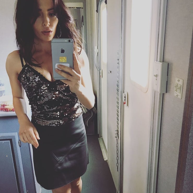 Sarah Shahi taking a selfie