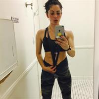Sarah Shahi taking a selfie