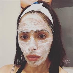 Sarah Shahi taking a selfie