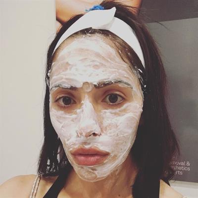 Sarah Shahi taking a selfie