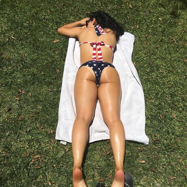 Sarah Shahi in a bikini - ass