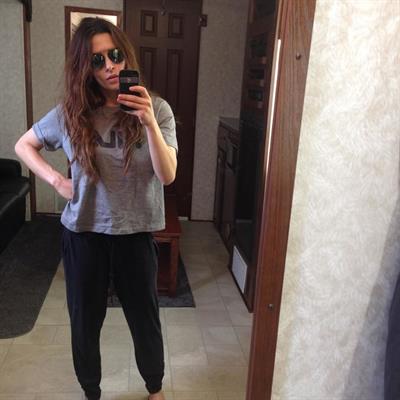 Sarah Shahi taking a selfie