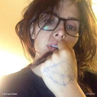 Sarah Shahi taking a selfie