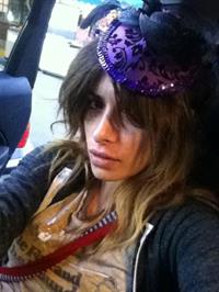 Sarah Shahi taking a selfie