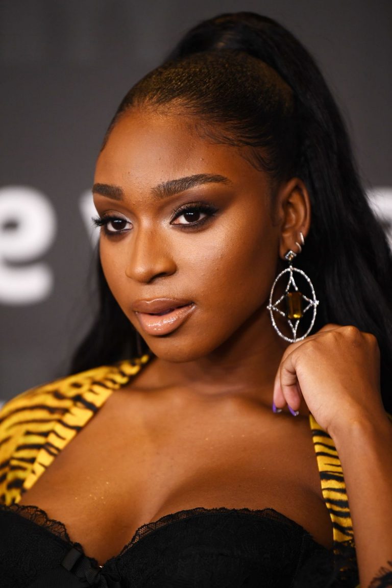 Normani Pictures Normani sexy showing nice cleavage seen by paparazzi showing up to the Savage X Fenty Show.
