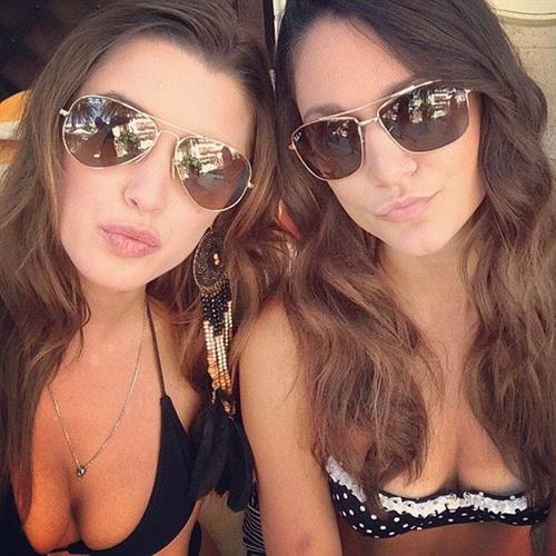 Alyssa Arce in a bikini taking a selfie