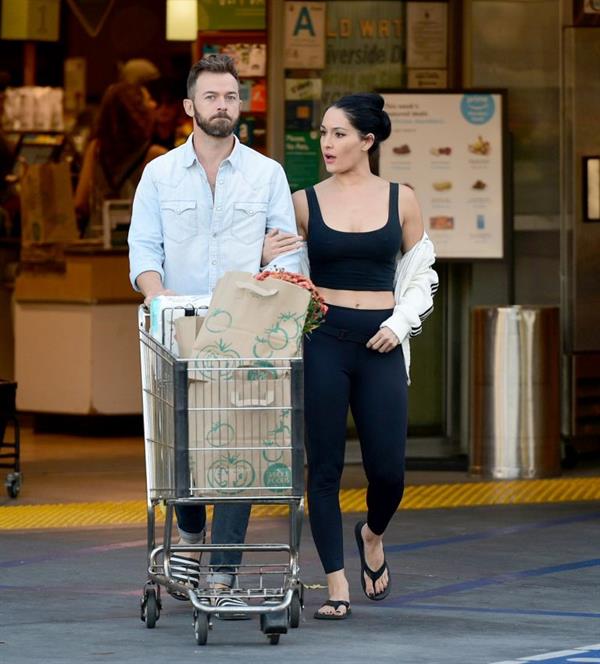 Nikki Bella braless boobs in a black tank top showing off her tits out grocery shopping seen by paparazzi.



















































