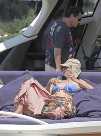Uma Thurman wearing a bikini top on a yacht in St Tropez July 7, 2013 