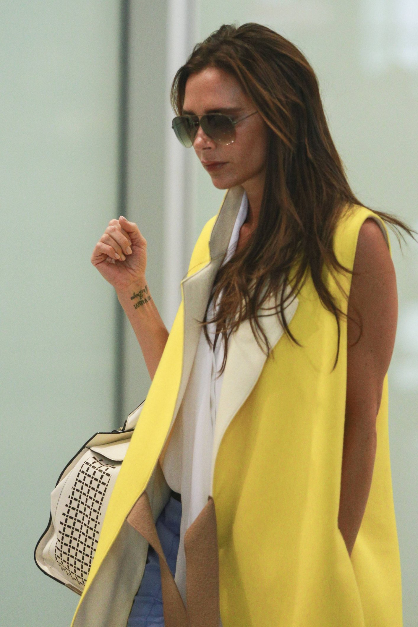 Victoria Beckham - Touches down in Beijing on June 21, 2013