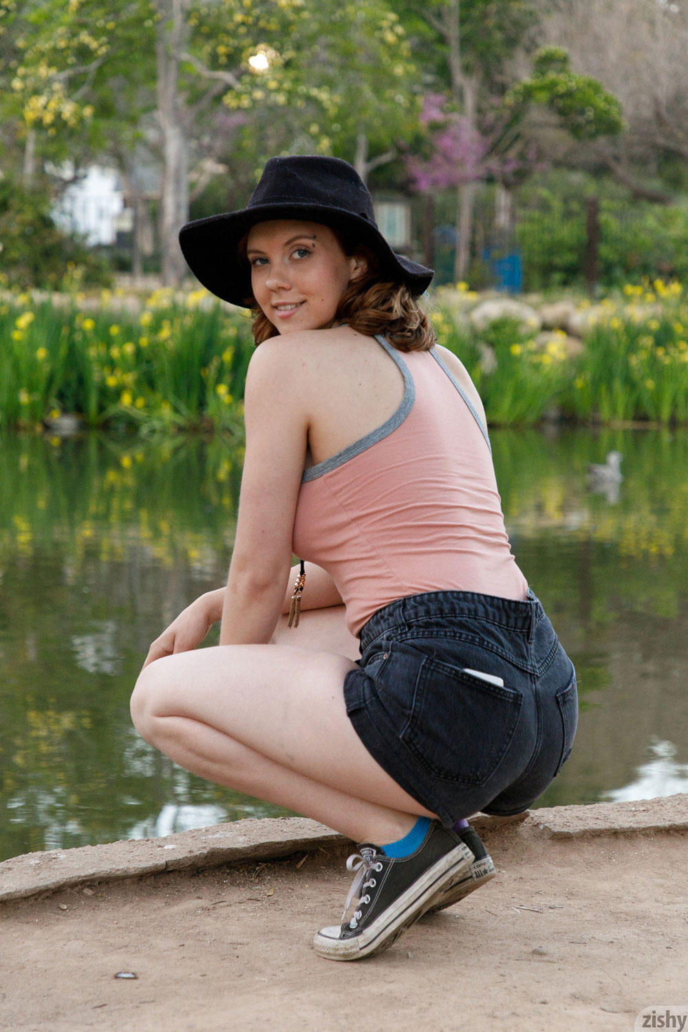 Kayla Coyote in Denim Shorts