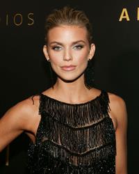 Annalynne McCord braless boobs in a sexy see through black dress photographed arriving to the Golden Globe Awards.