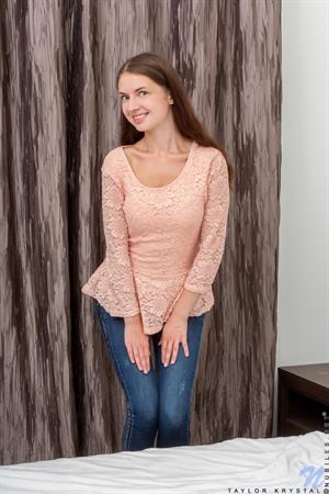 We can't get enough of lusty cutie Taylor Krystal! She's a total flirt who comes off a little bit shy, but this voracious sex kitten won't leave you hanging. She flings her bra away to flash her titties, then rolls her thong down her legs and goes to work on her creamy twat with her magic fingers.