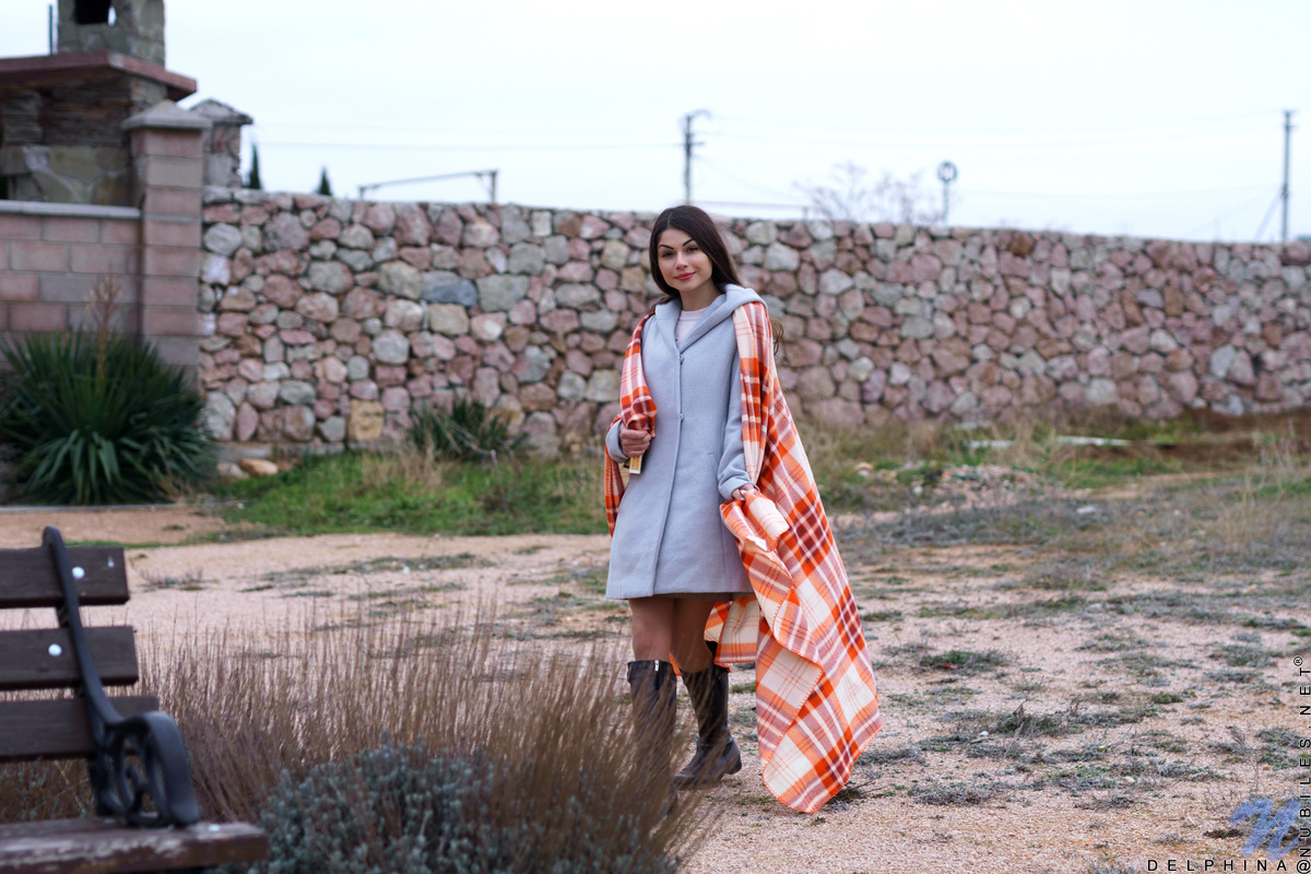 Long chestnut hair waves in the wind before Delphina comes inside. Relocating to the bedroom, she peels off her panties and slides her fingers down her slippery twat. She's already wet and ready to cum, so watch her slide her fingers into her cream filled fuck hole as she moans in pure delight.