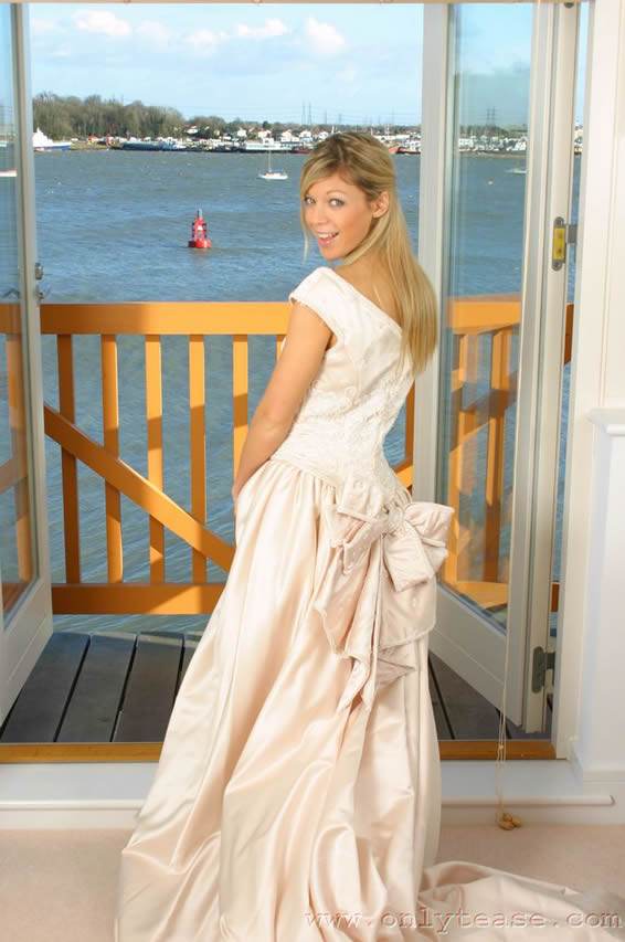  Sexy blonde in wedding dress with white lingerie 