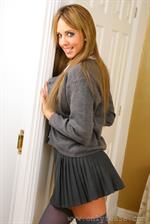  Long haired beauty in college uniform and sexy pink lingerie. 