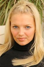  Gorgeous blonde Sam K in black secretary outfit with stockings 
