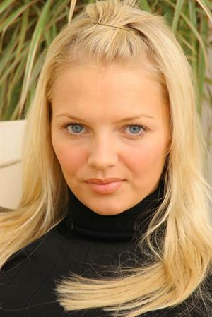 Sam K Nude Pictures Gorgeous blonde Sam K in black secretary outfit with stockings