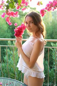 Busty Danniela in the backyard