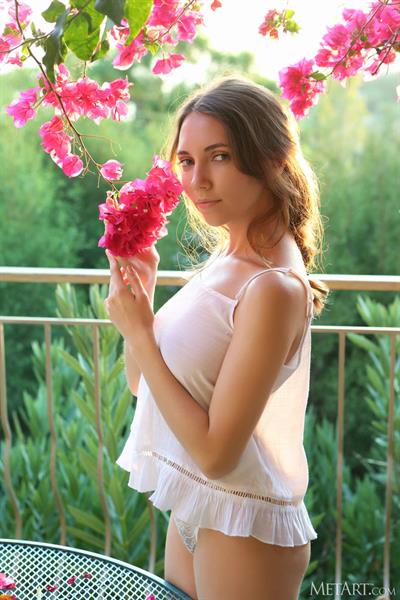 Busty Danniela in the backyard