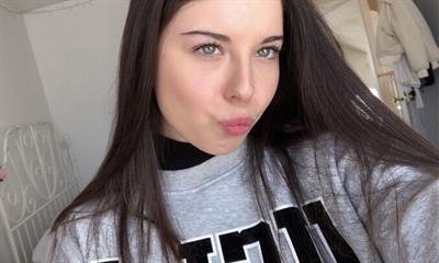 Olivia F taking a selfie