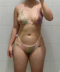 Anonymous in a bikini taking a selfie