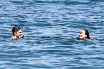 Olivia Wilde on the beach and in the water in Hawaii - May 26, 2013 