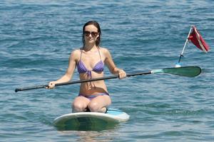 Olivia Wilde on the beach and in the water in Hawaii - May 26, 2013 