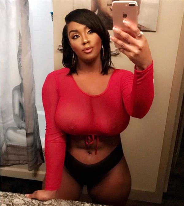 Layton Benton taking a selfie and - breasts
