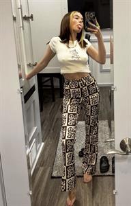 Zoey Deutch braless boobs in a sexy tight little top showing off her big tits nipple pokies.