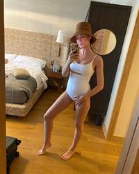 Odette Yustman taking a selfie