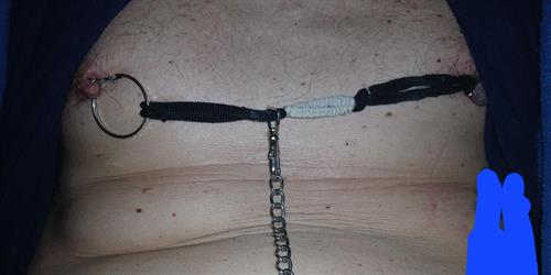 Anonymous taking a selfie and - breasts