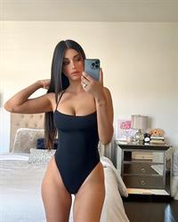 Jasmine Bagheri in a bikini taking a selfie