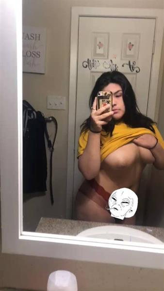 Marina Rivera taking a selfie and - breasts