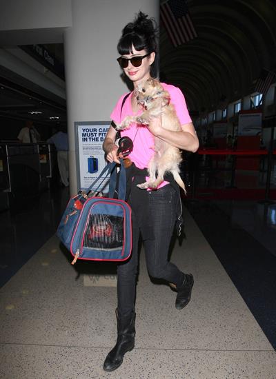 Krysten Ritter - Prepares to leave LAX in Los Angeles, California - June 8, 2012 