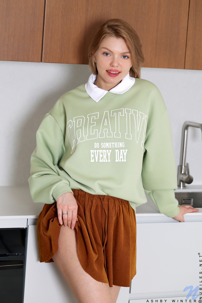 Whenever sexy Russian coed Ashby Winter comes home she doesn't wait long before her clothes start coming off so she can enjoy the charms of her busty body.