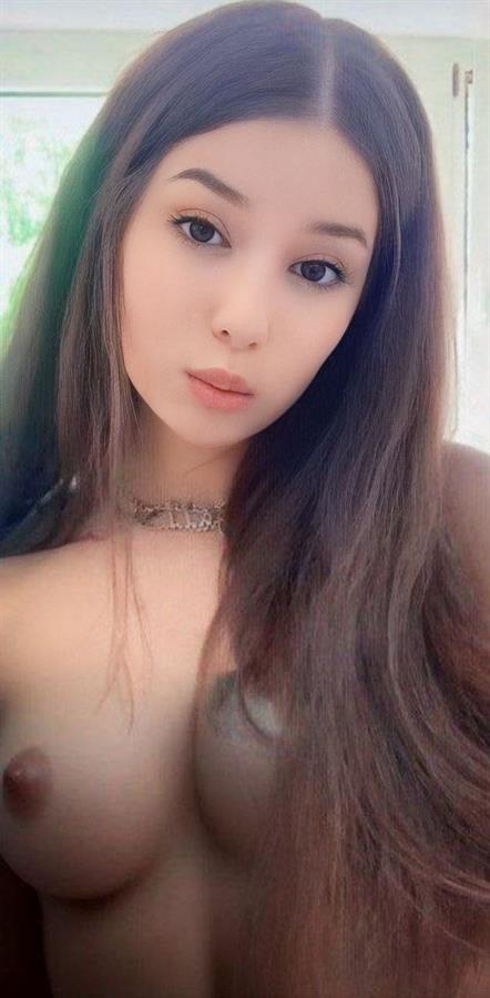 Agara taking a selfie and - breasts
