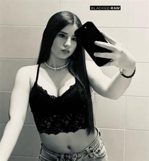 Emma in lingerie taking a selfie