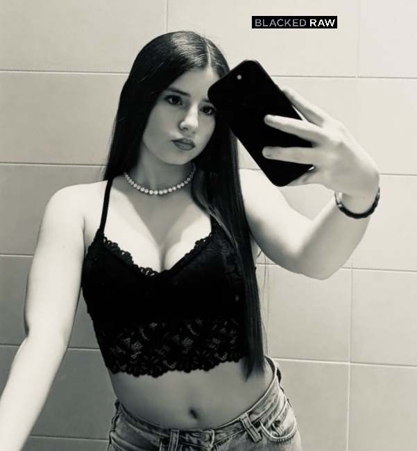 Emma in lingerie taking a selfie