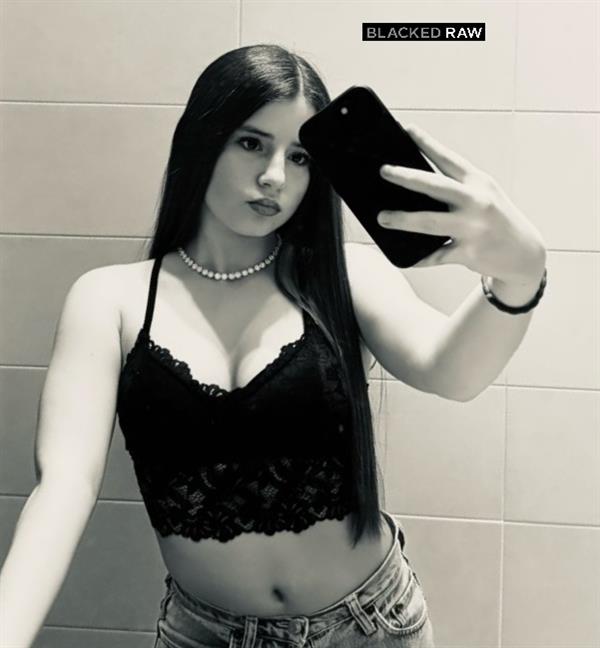 Emma in lingerie taking a selfie