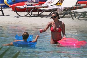 Alex Morgan and Sydney Leroux in bikinis on the beach in Hawaii