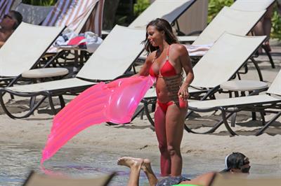 Alex Morgan and Sydney Leroux in bikinis on the beach in Hawaii