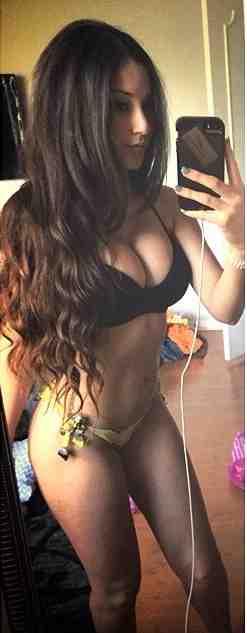 Angie Varona in a bikini taking a selfie